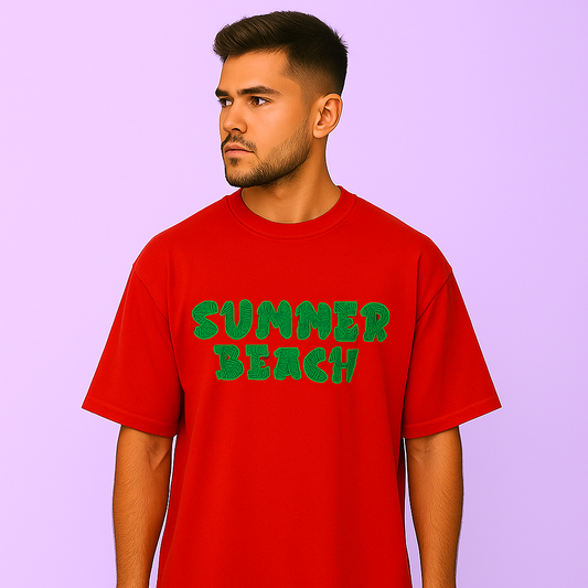 Model wearing a red oversized t-shirt featuring 'Summer Beach' print, perfect for casual summer outings.